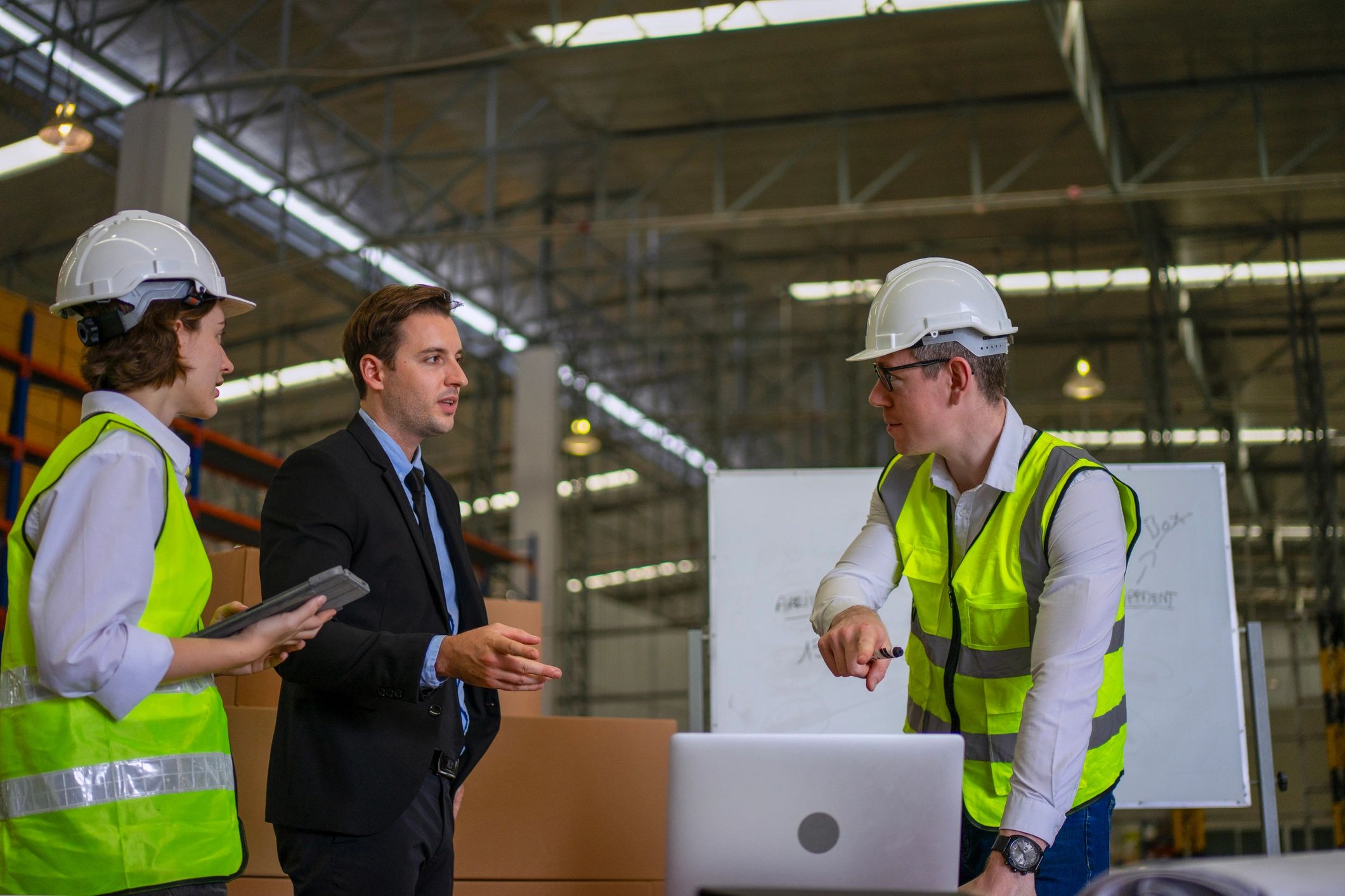 Warehouse operations team collaborating with digital tools