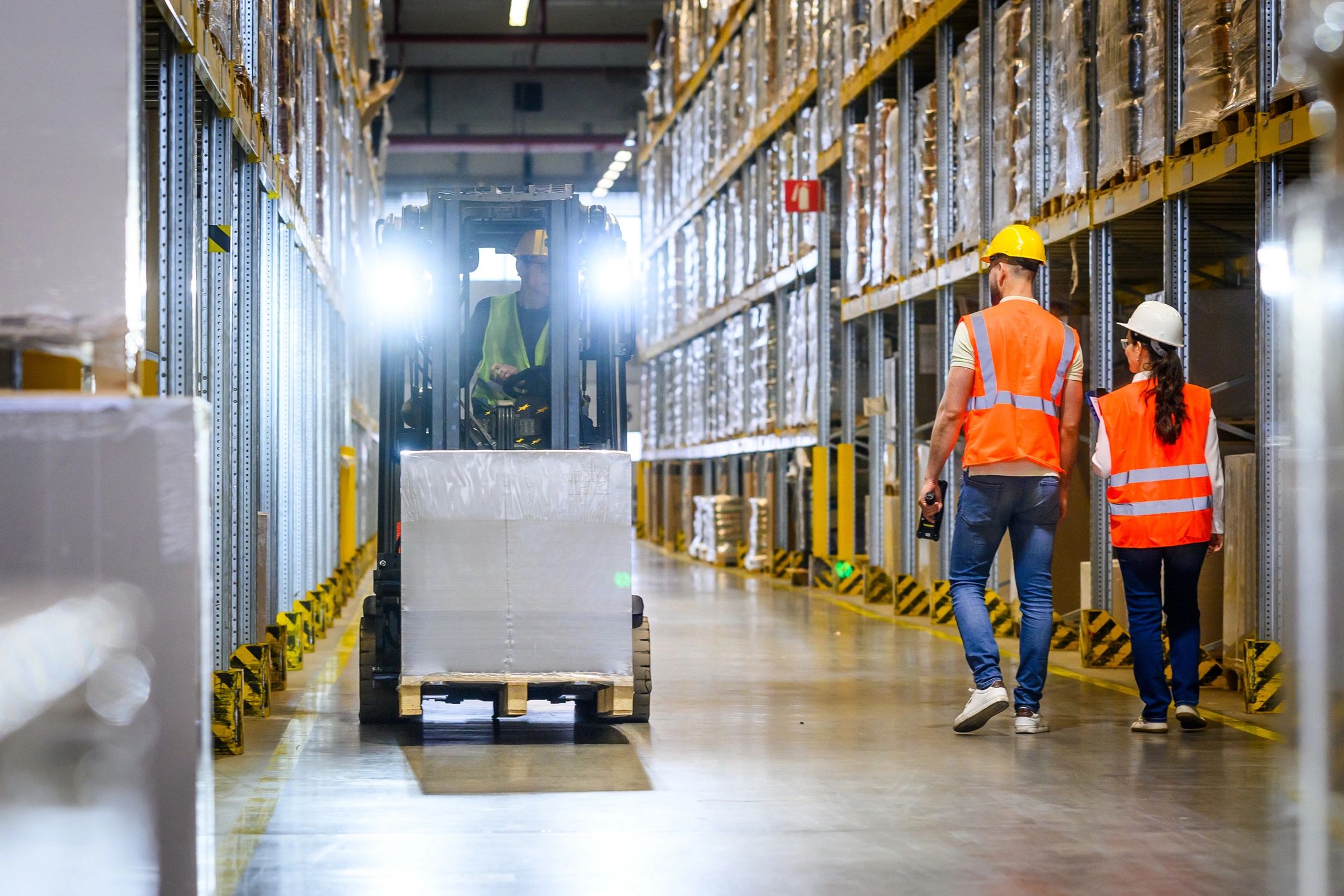 Logistics operations team coordinating warehouse activity